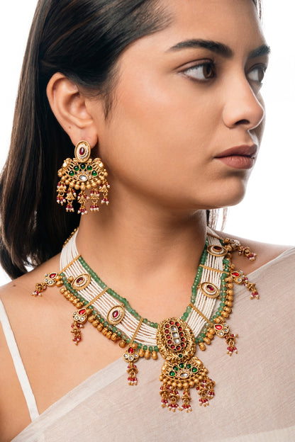 Majestic Kundan Necklace Set with Green Stones & White Beads